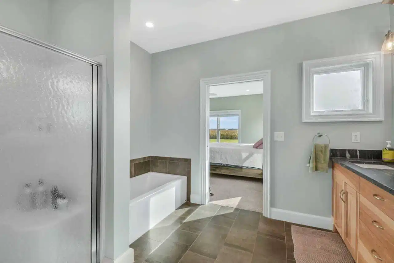 En-suite bathroom in Ranch-style custom built Leesburg, IN home.