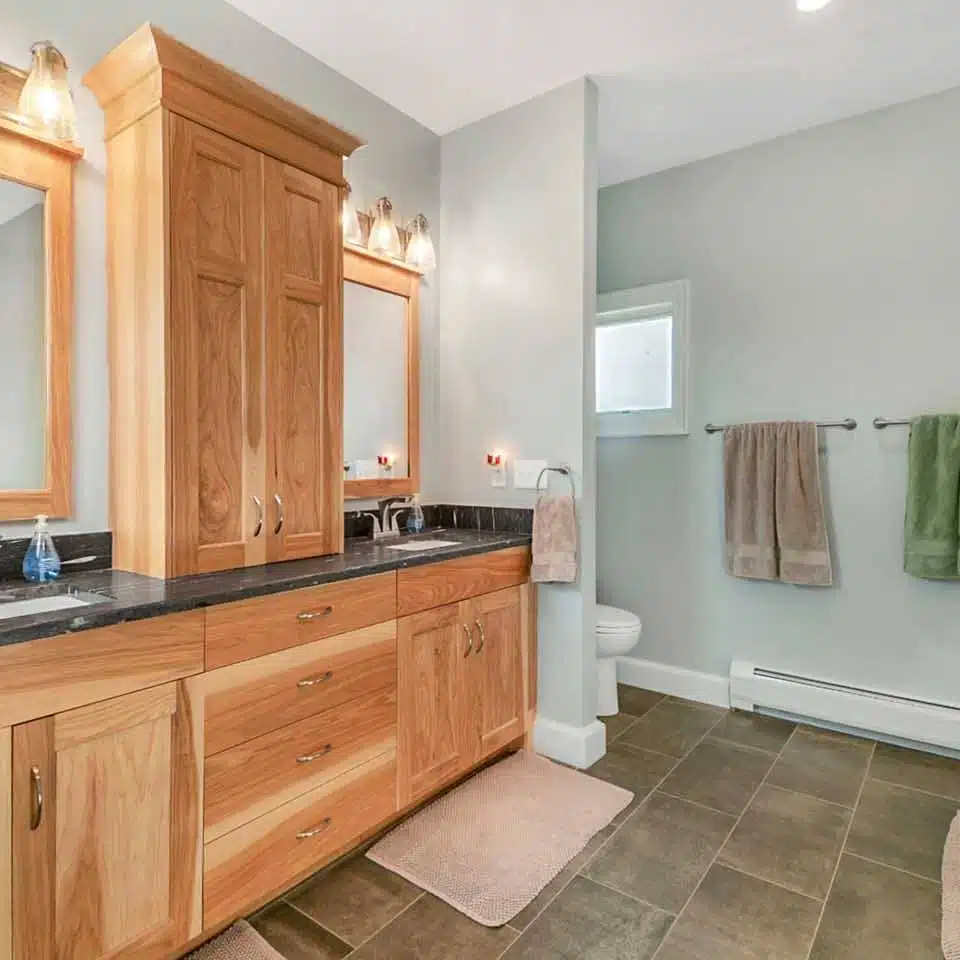 Master bath with dual sinks in Ranch-style custom built Leesburg, IN home.
