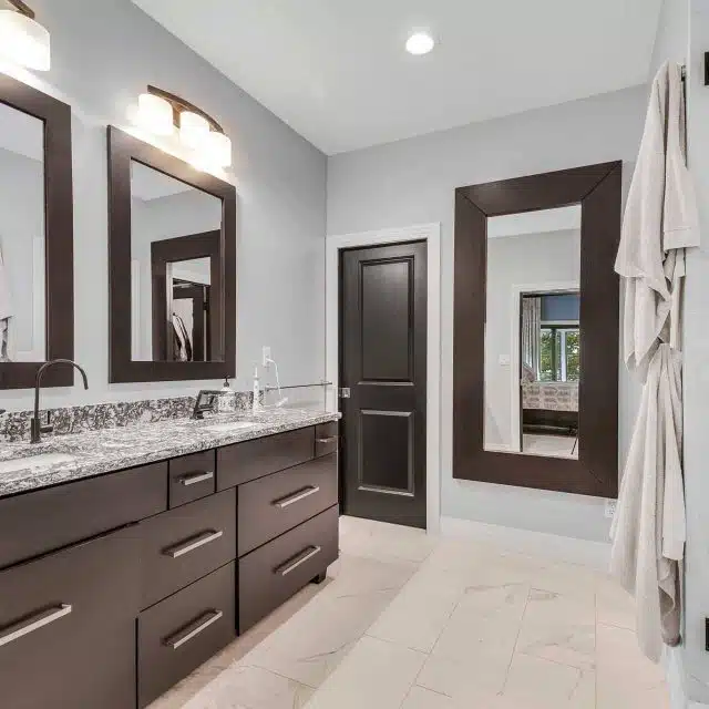 Interior master bath of Winona Lake two-story custom-built home with white siding and black trim.