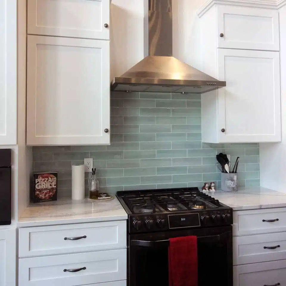 Kitchen backsplash and cabinet renovation completed by Timber Rock Construction